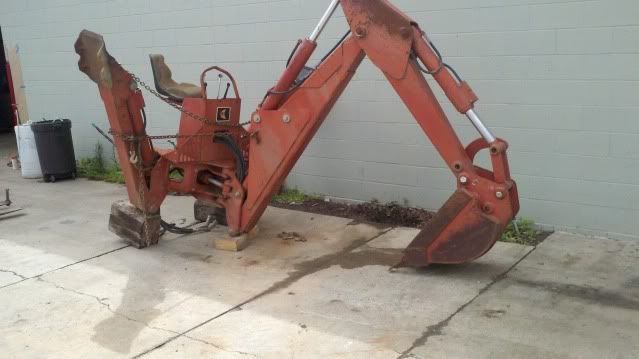 ditchwitchbackhoe.jpg